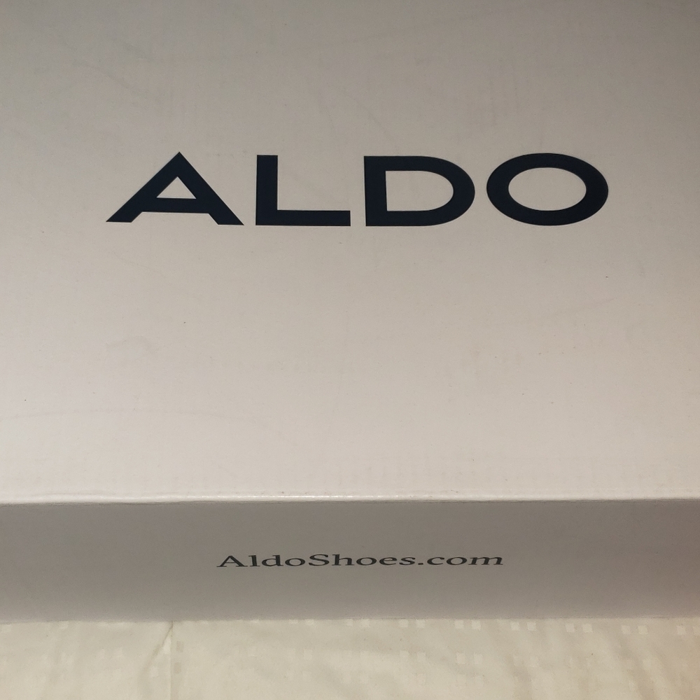 Aldo's orange sneakers.